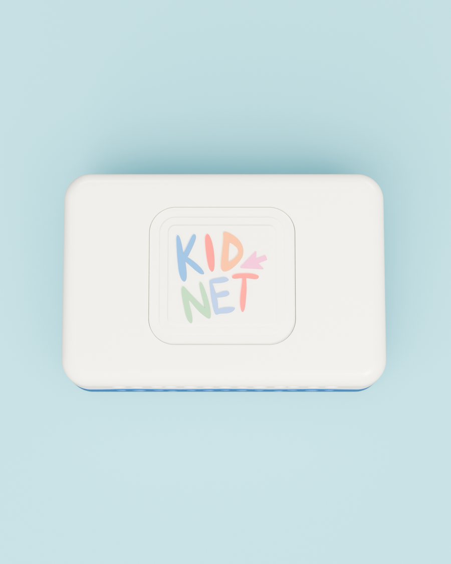 The KidNet box, a small white and blue case, seen from above on a pale blue table.